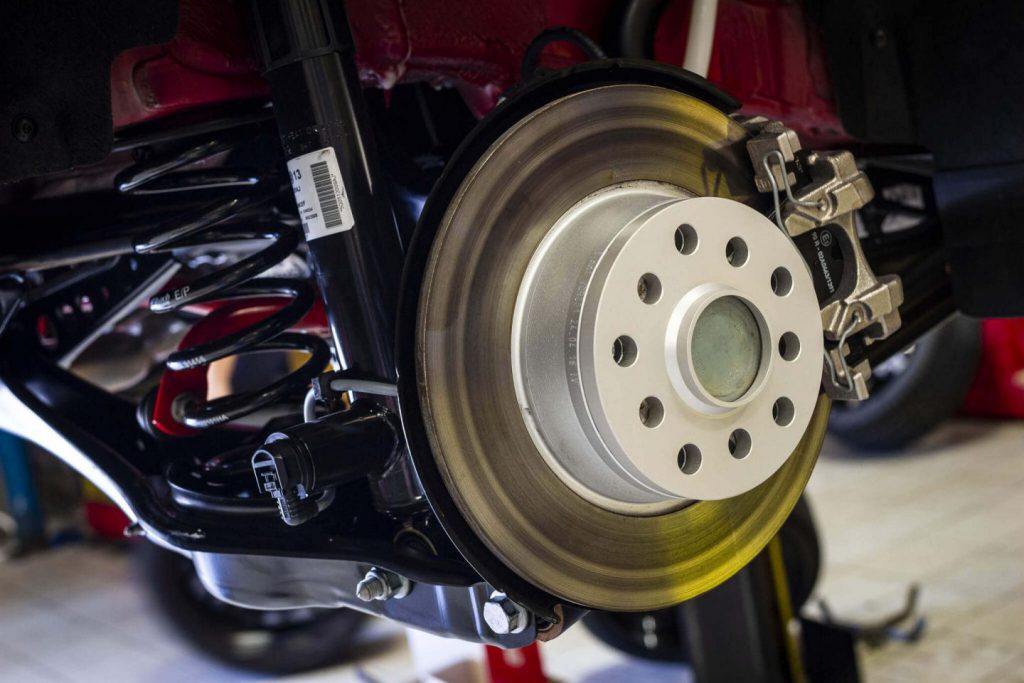 Close up of lowering springs being fitted