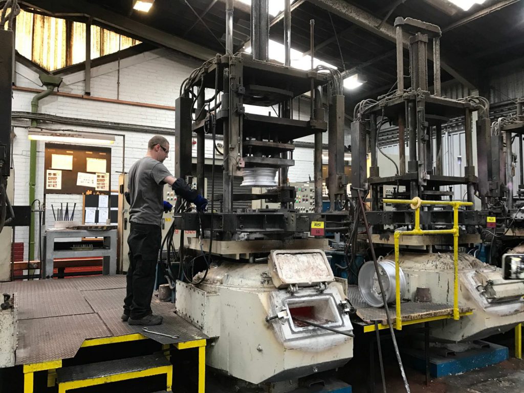 a wheel being machined