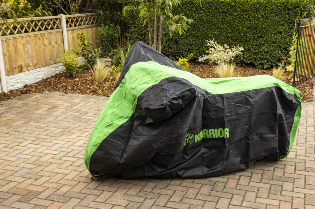Warrior Premium Outdoor Motorcycle Cover on a driveway