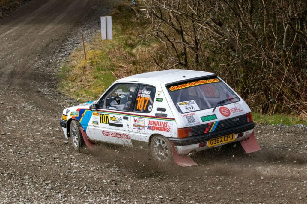 Jenkins Rallying Peugeot 205 taking on the rough terrain