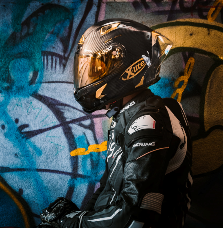 How should a motorcycle helmet fit?