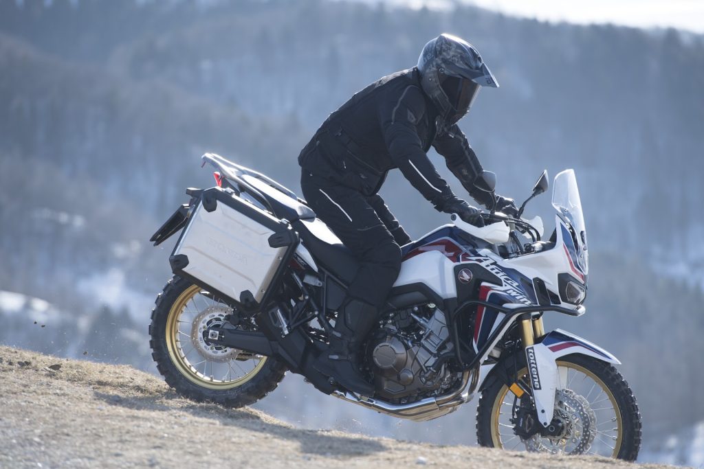 touring bike going down hill with protection